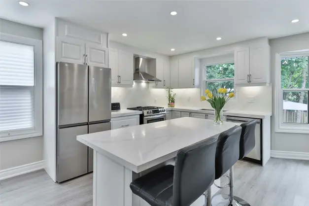 Complete kitchen renovation Cambridge with updated cabinetry, modern finishes, and a redesigned functional kitchen.